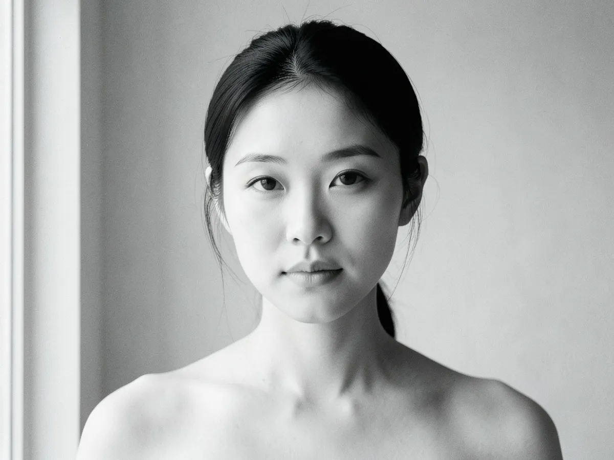 Black-and-white portrait used to judge overall value — light, medium or deep coloring